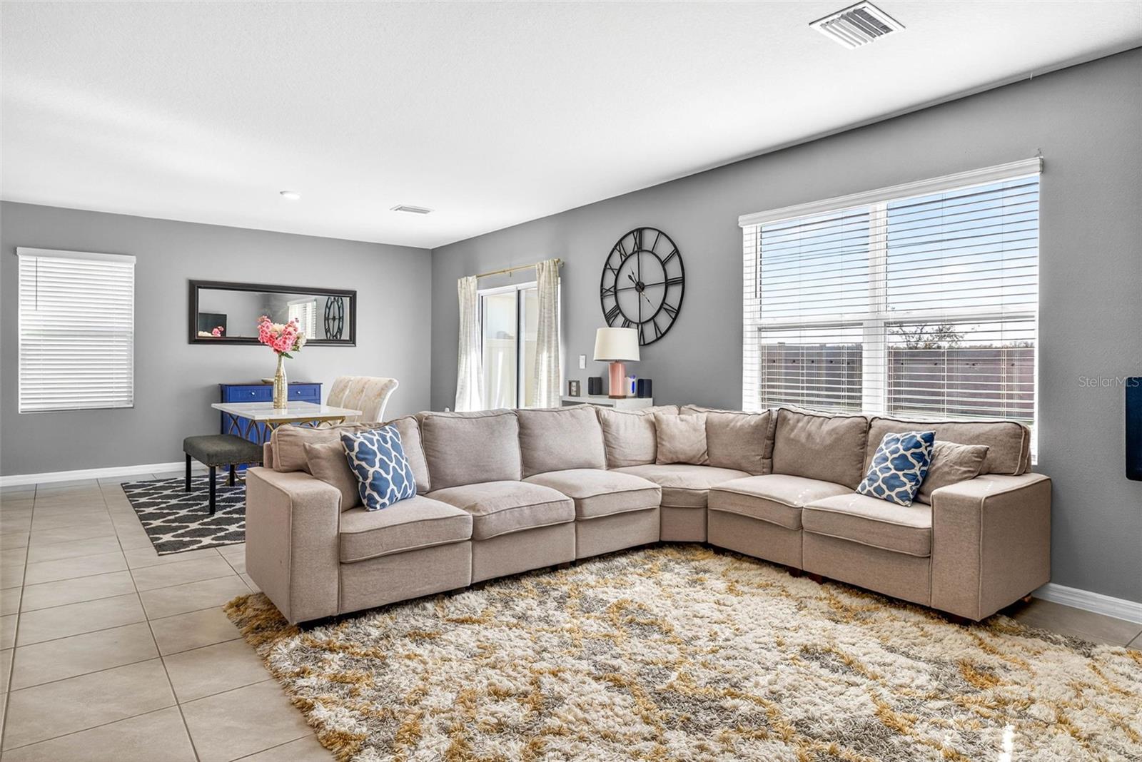 Living room fits large sectional with more space still available