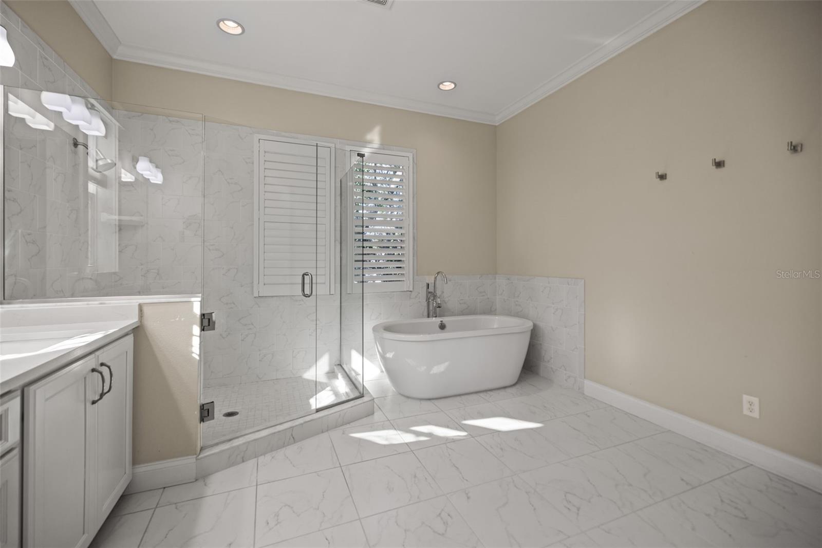 Primary Bathroom with Shower and Free Standing Tub