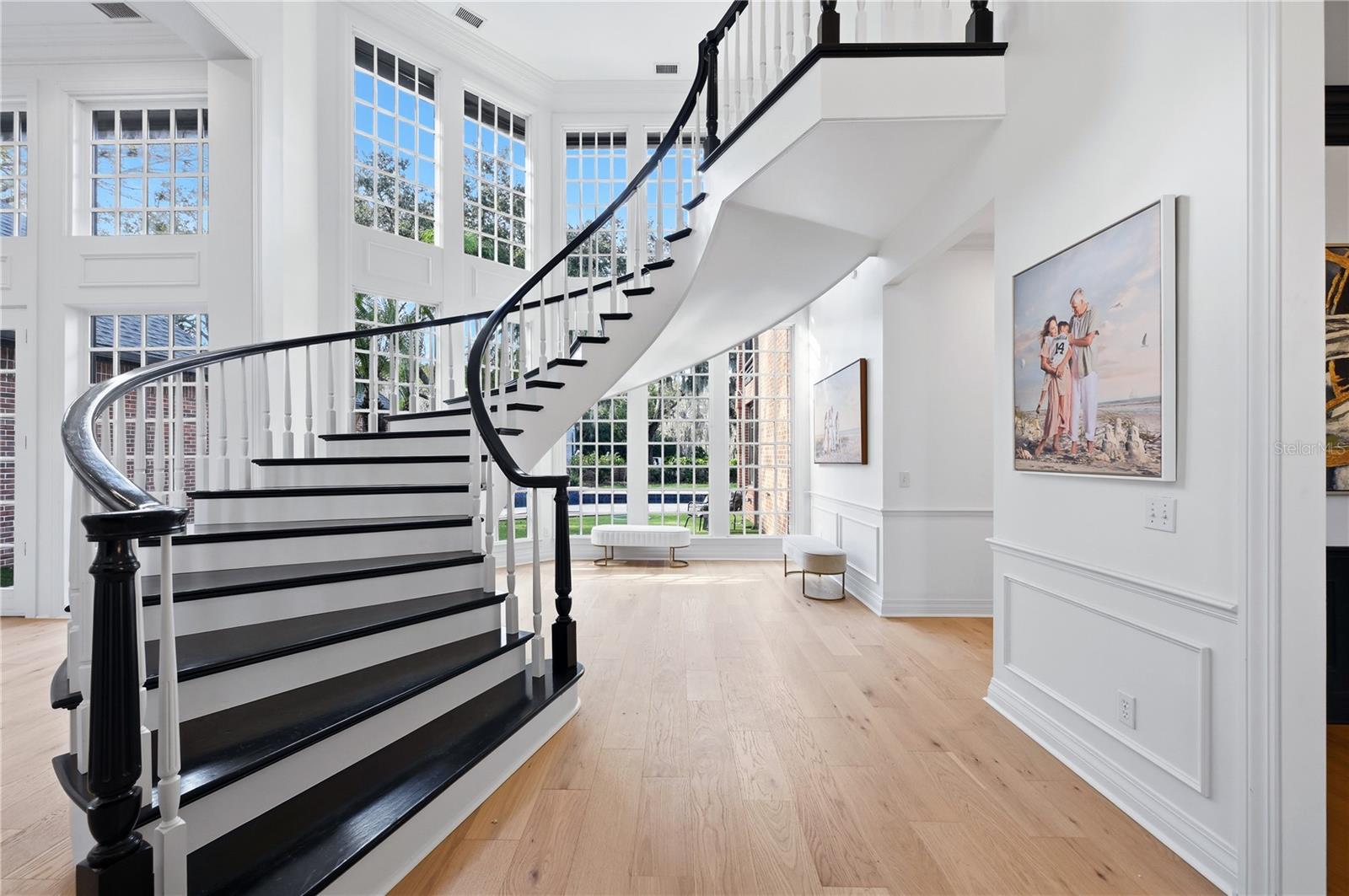 Grand romantic curved stairway! Statement piece