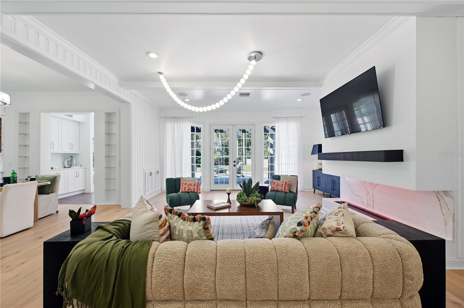 Large family room with WATER VAPOR FIREPLACE! WOW factor