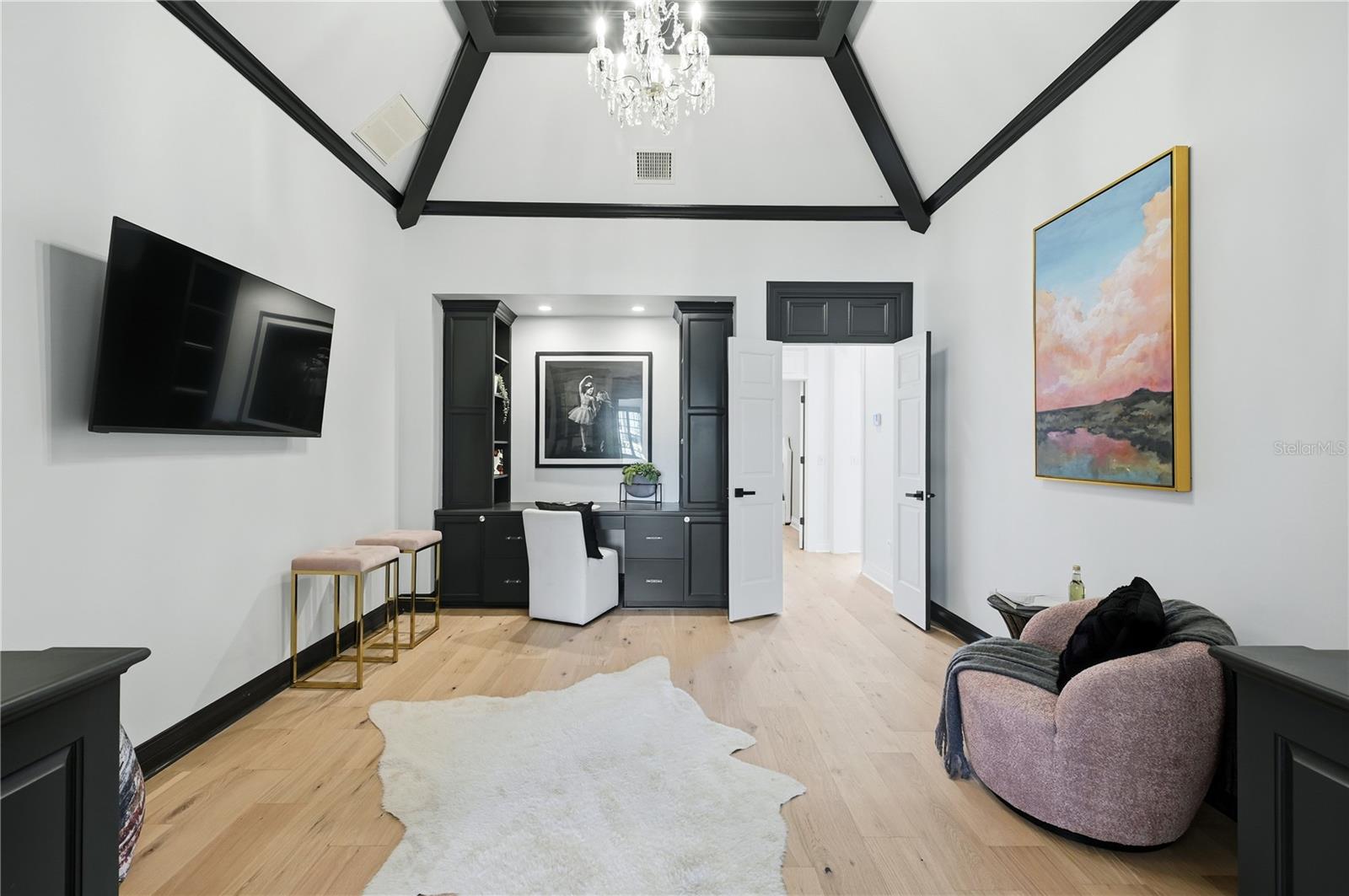 Beautiful ceiling detail and built ins. Depending on lifestyle can be a nursery, playroom, office, media room, craft room or video game lounge!