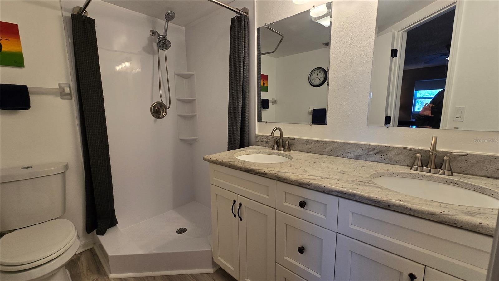 Full bath with double sinks upstairs