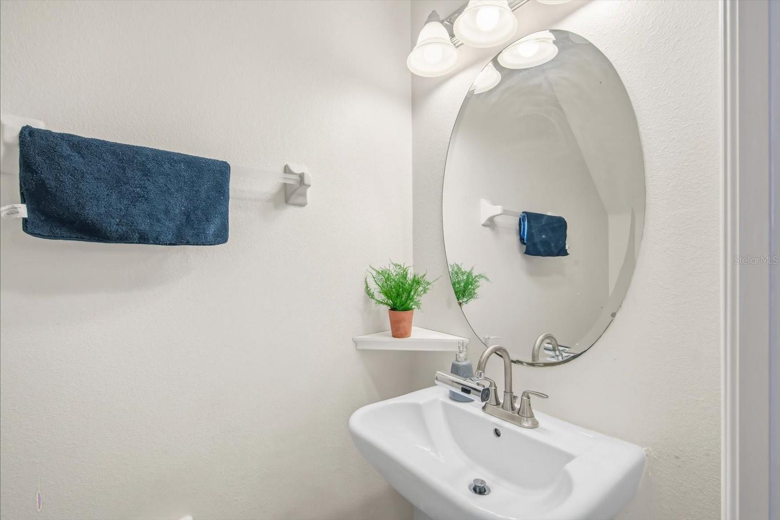 Guest half bath downstairs.