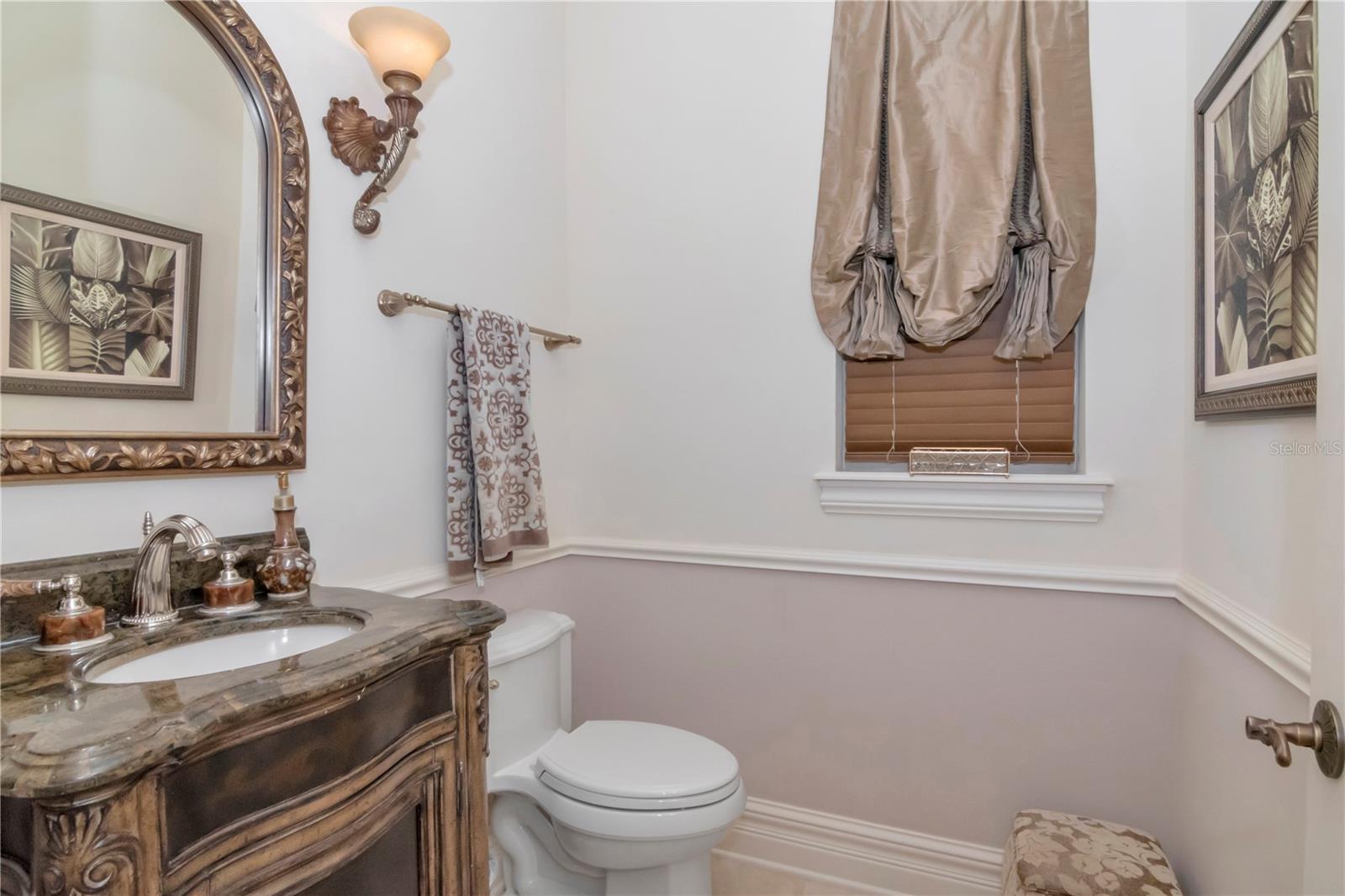 Powder room adjacent to office