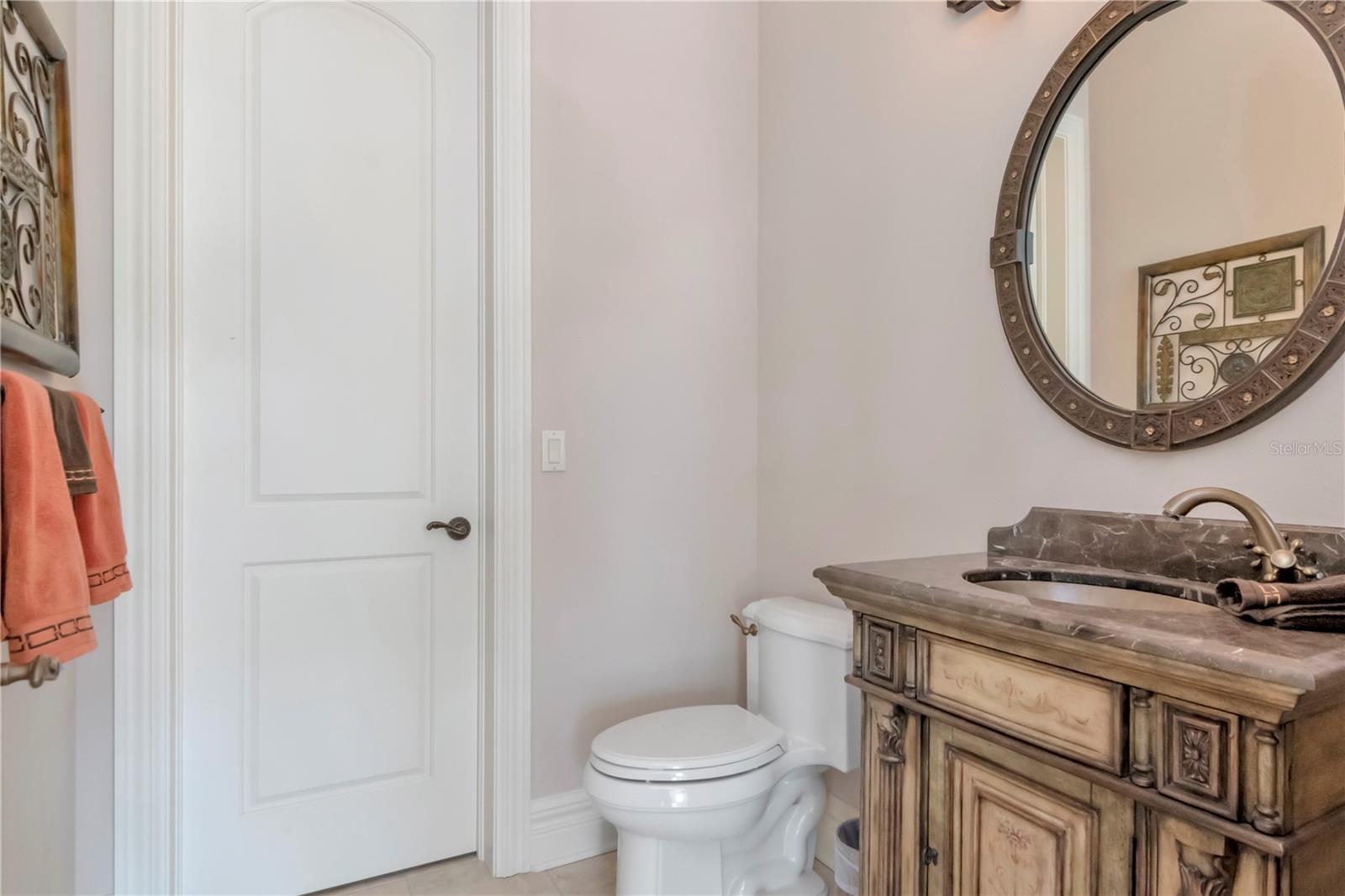 Powder room adjacent to bonus room