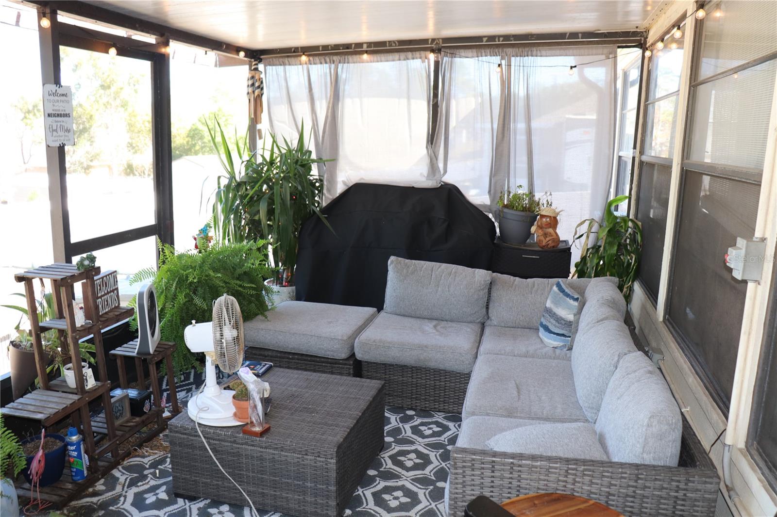 COVERED SCREENED IN BACK PORCH