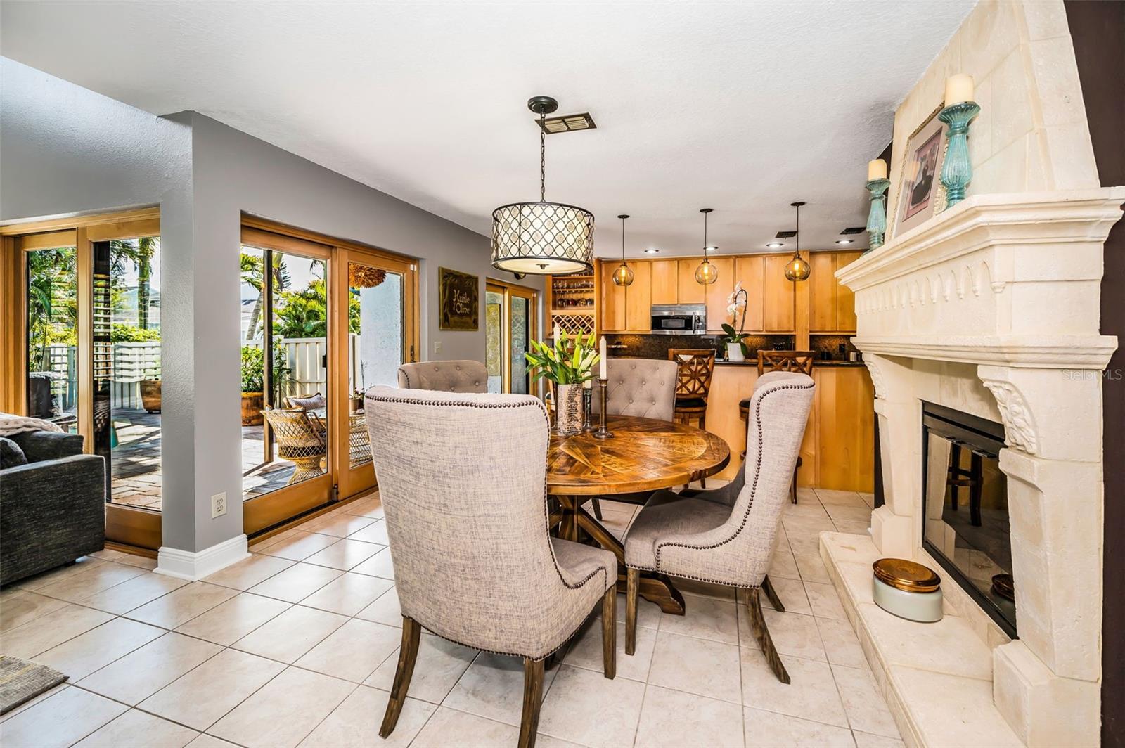 Dining and kitchen area, electric fireplace