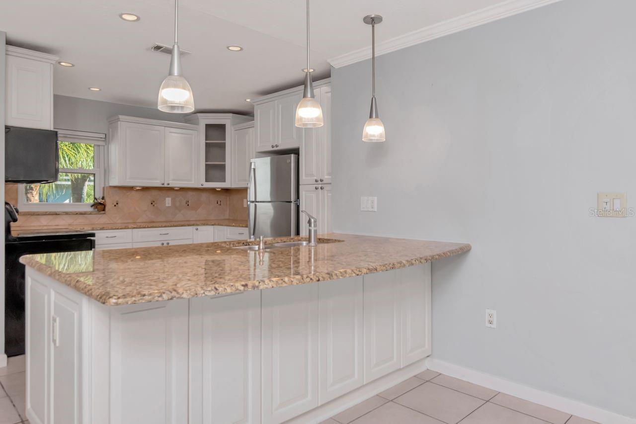 Great under-counter storage capacity in updated kitchen