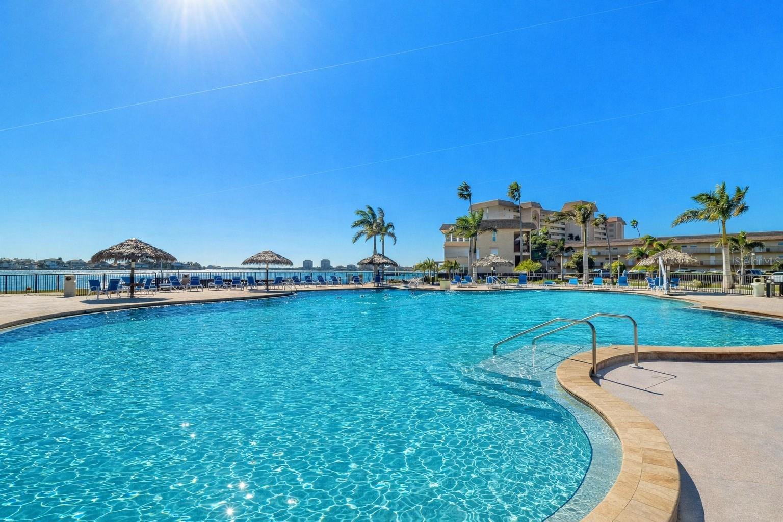 Enjoy four stunning pools set directly on the water—resort-style living at its best.