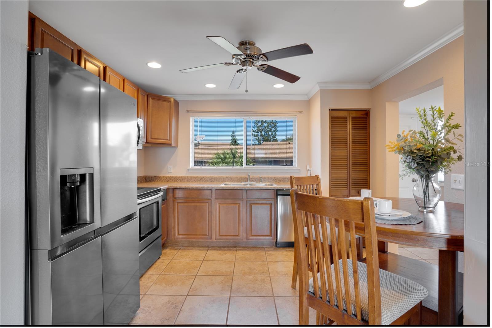 Kitchen with Stainless Steel appliances with pantry