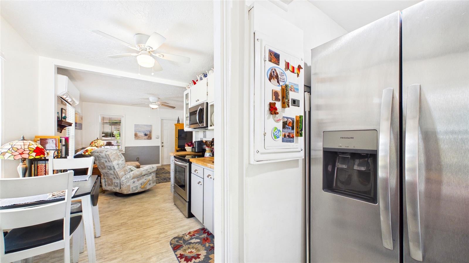 Full pantry and fridge space off of kitchen
