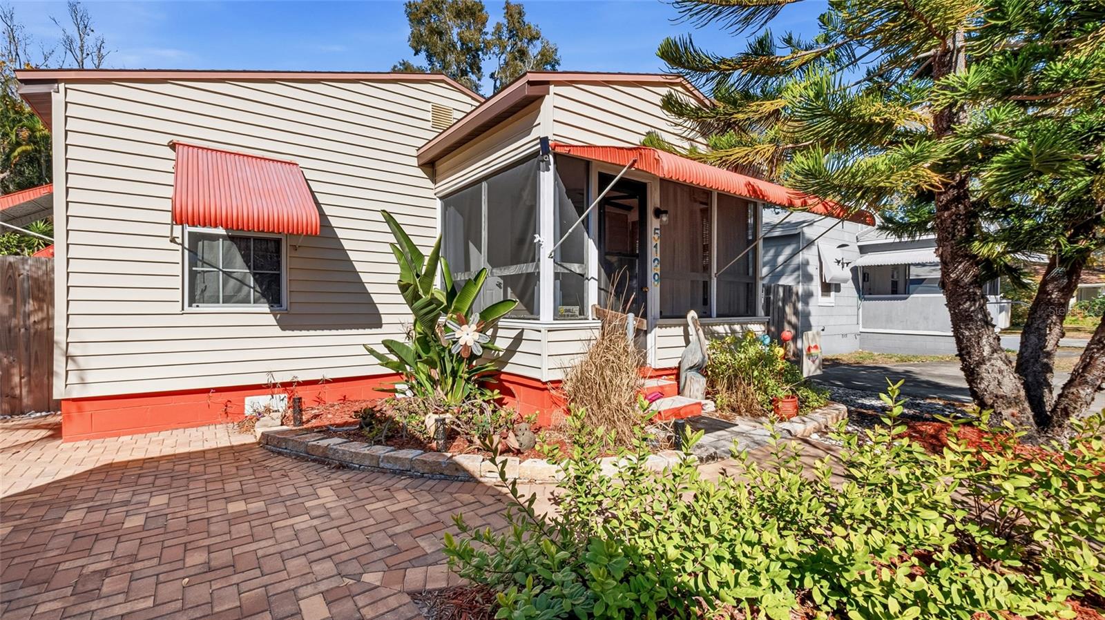 Professionally paved brick driveway and sidewalk
