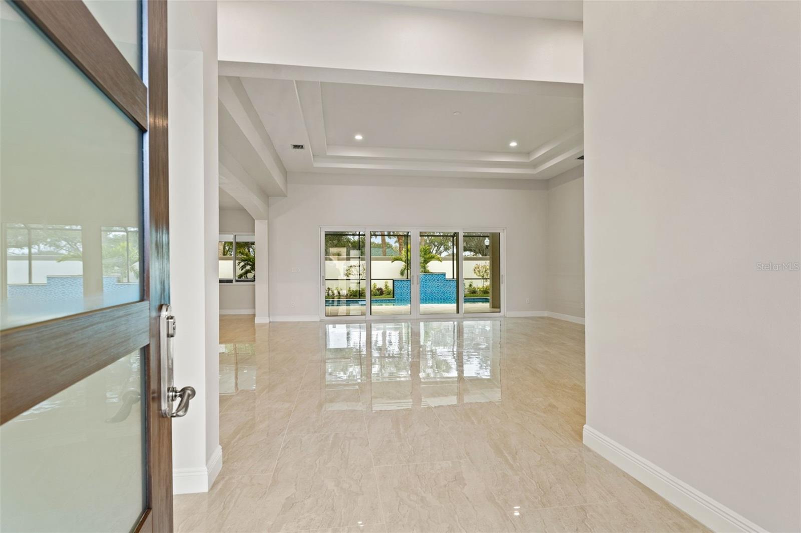 Great Room over looking Resort Style Pool area.