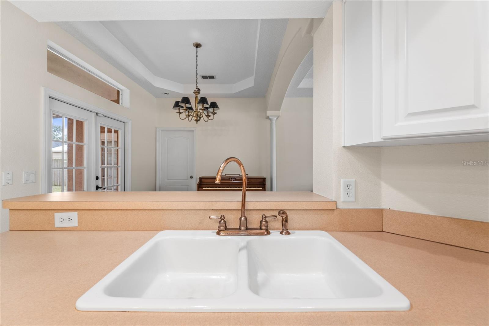Kitchen into dining room view