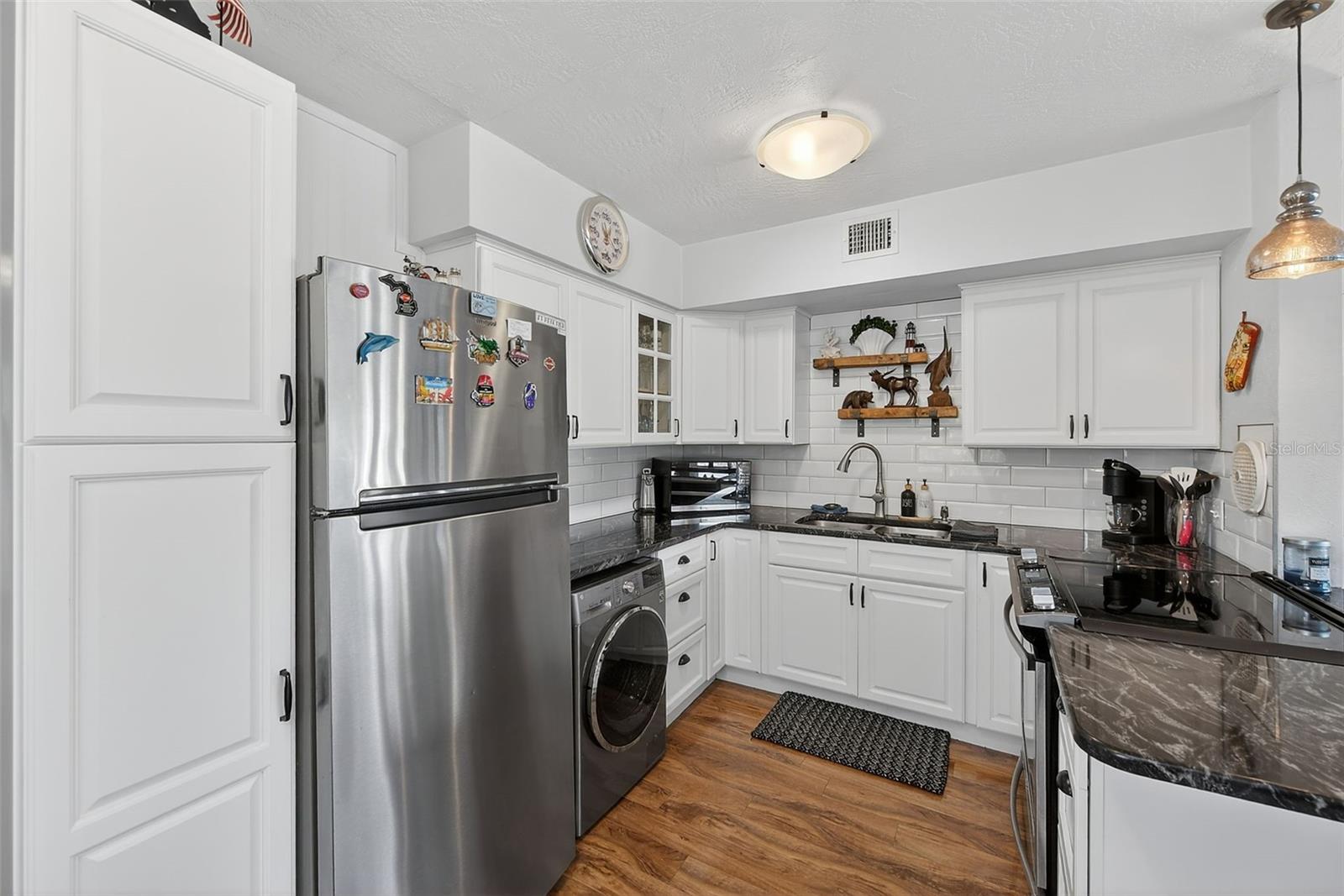 Kitchen with washer/dryer combo