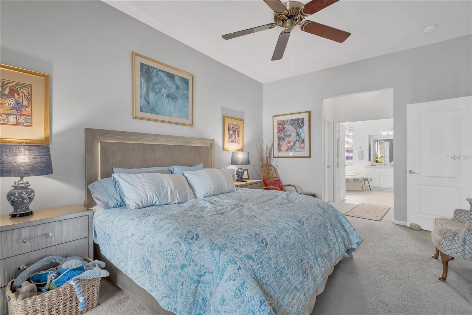 Primary Bedroom with two walk-in closets and en suite primary bathroom