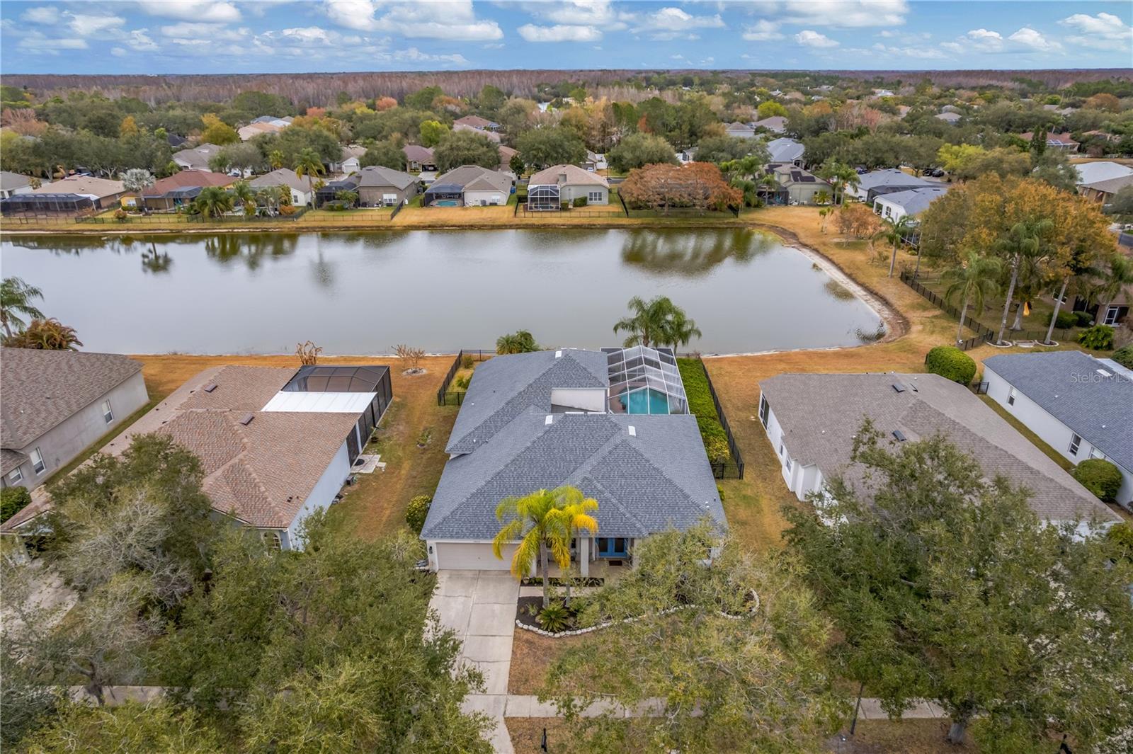 Aerial View of home sitting directly on Lake Fern.