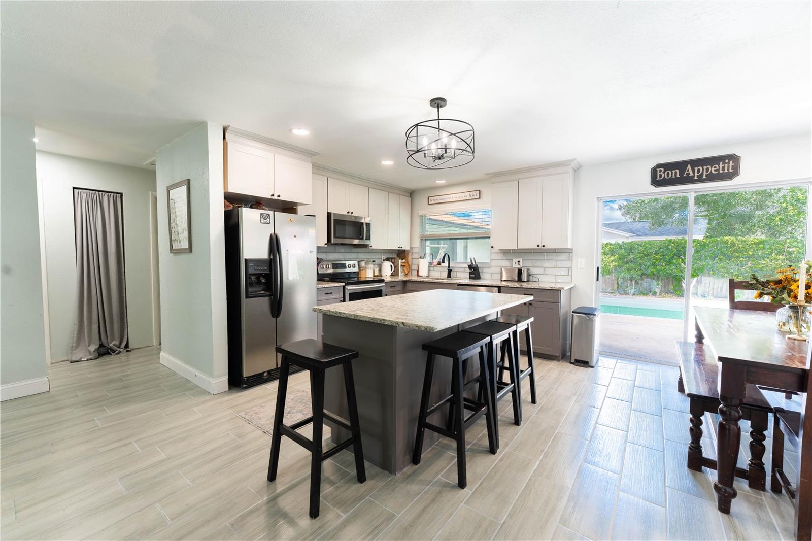 Newly updated kitchen with easy access to pool area.