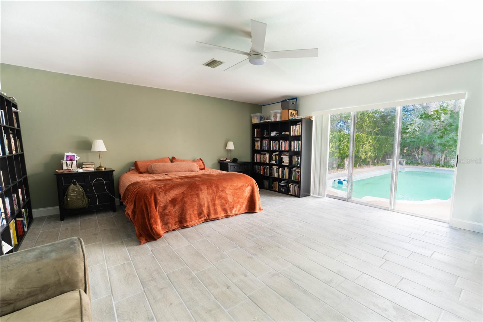 This primary suite offers pool access.