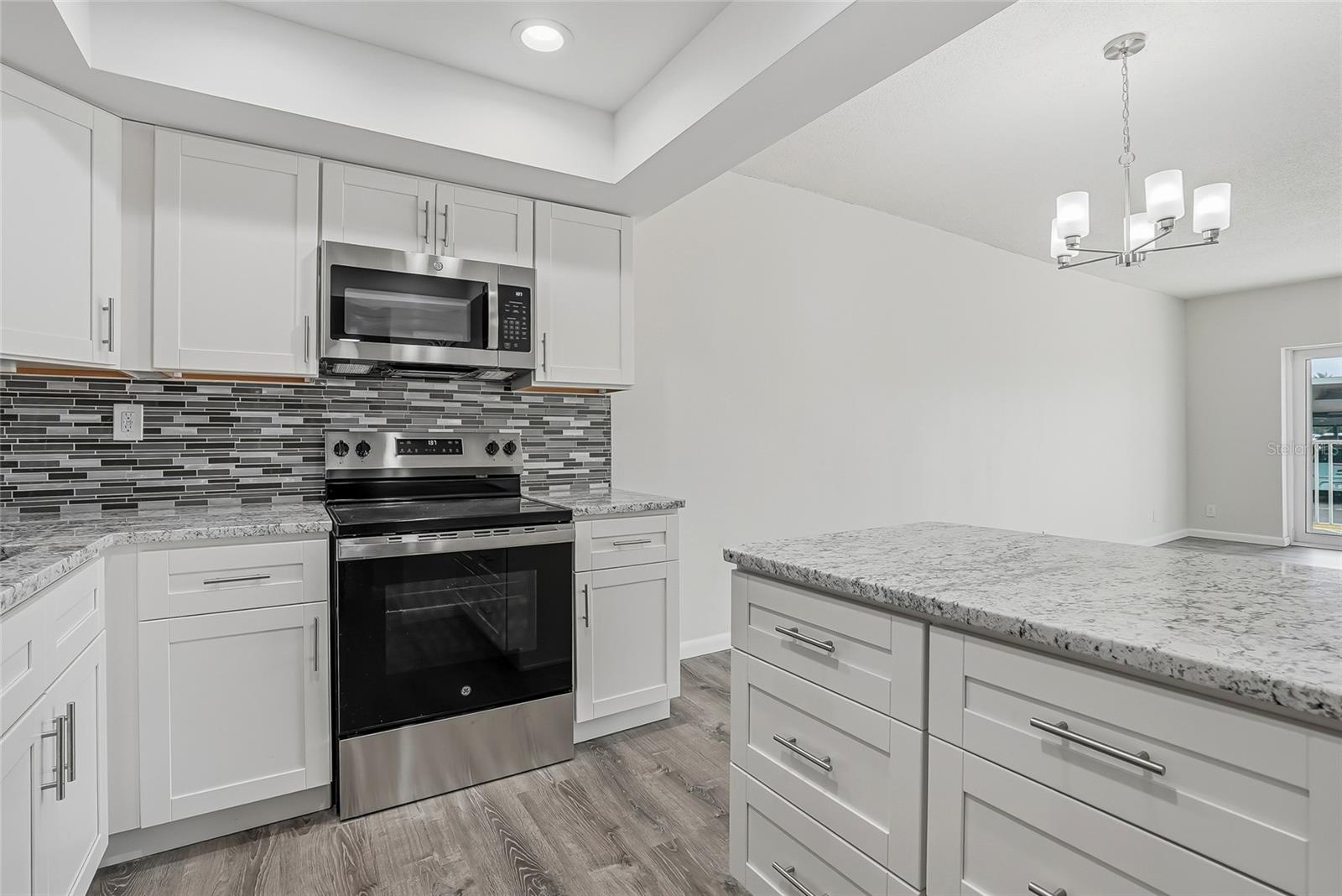 Lots of cabinets to store cooking gadgets.