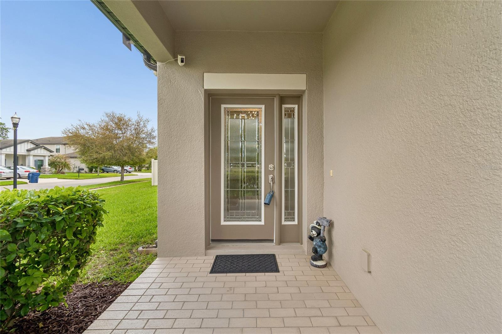 Glass door entry with sidelight