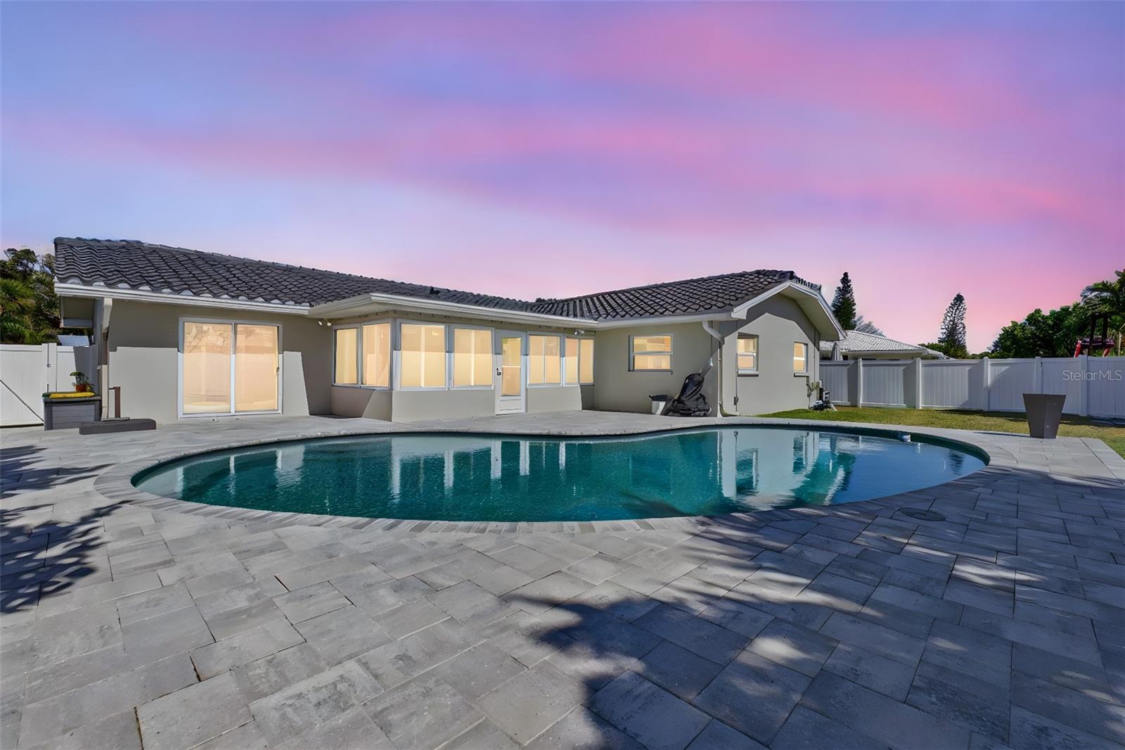 Beautiful outdoor living space around a fully updated pool and equipment.