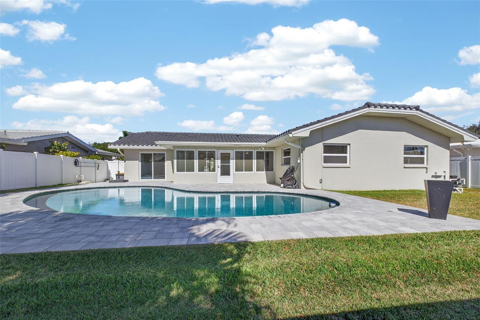 Plenty of opoen space in the back yard for pets, games and relaxation .