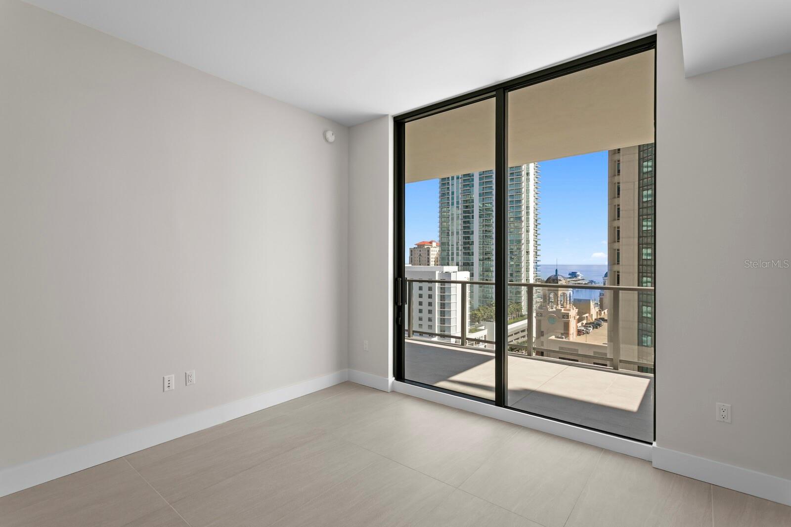 Ensuite Guest Bedroom with access to balcony