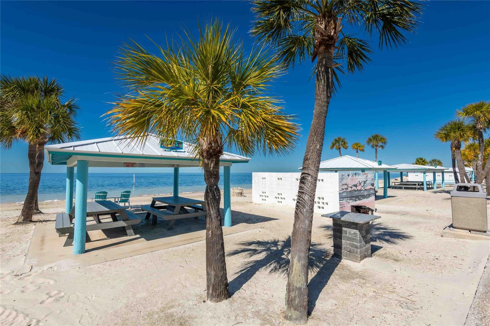 Sandy beach with 21 pavilions, grills, restrooms, and breathtaking sunsets!