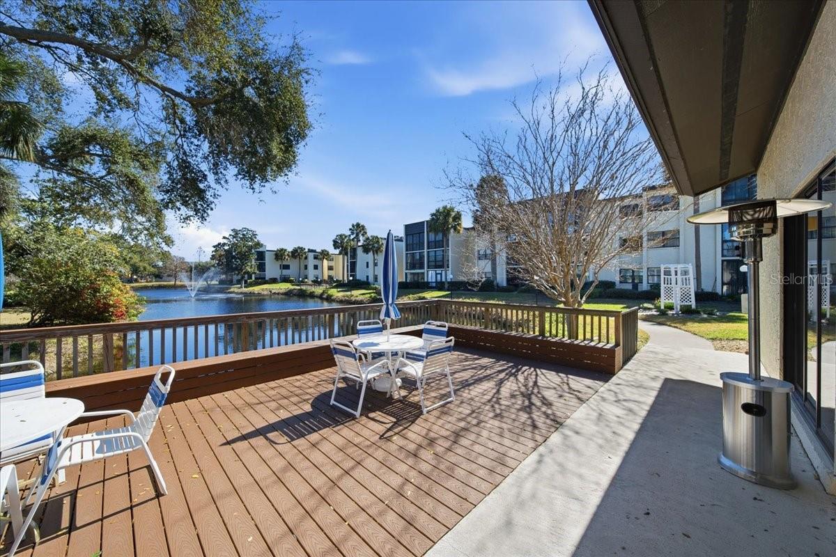 Deck off the clubhouse/pool - lakeside with heaters for the winder when it's a bit chilly!