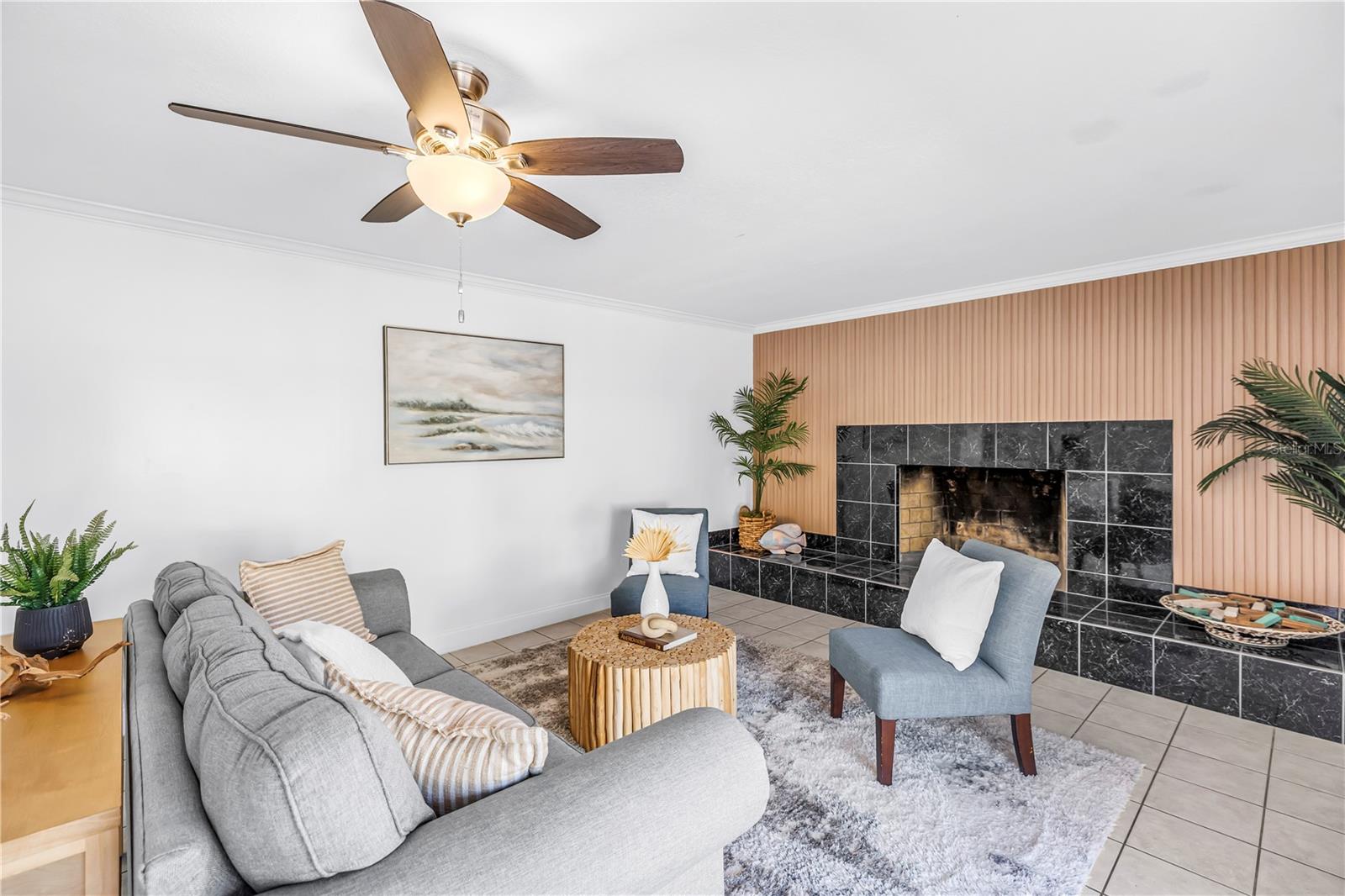 Updated feature wall with wood burning fireplace