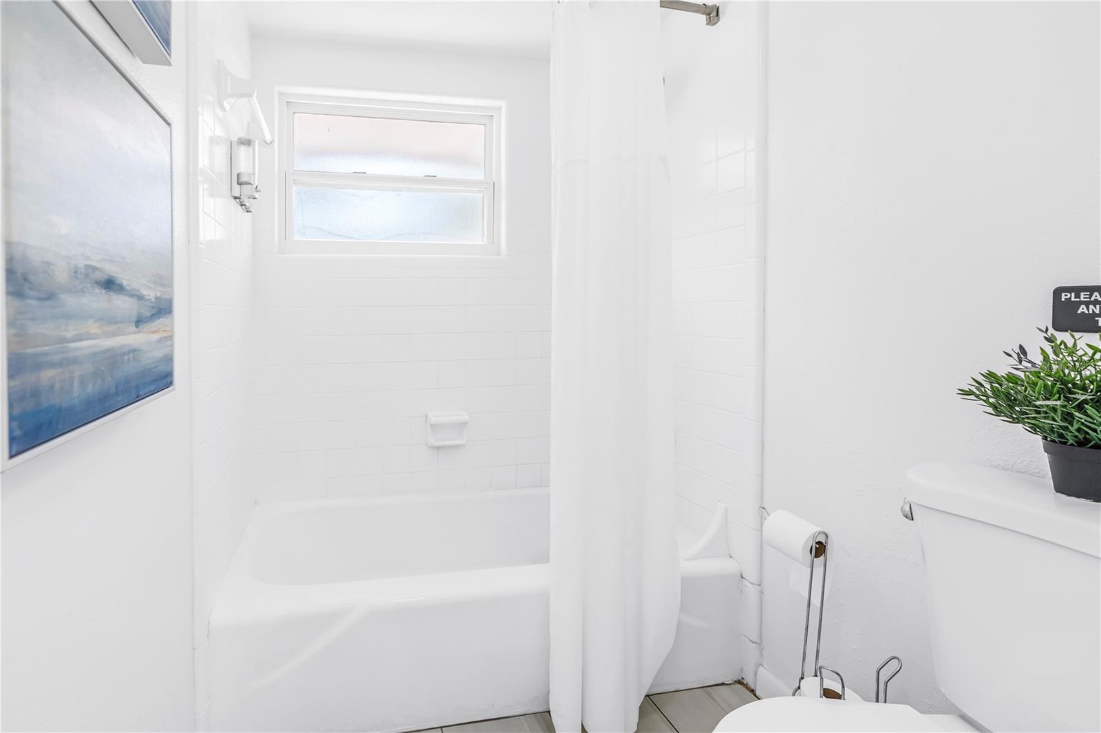 Separate shower/tub combination