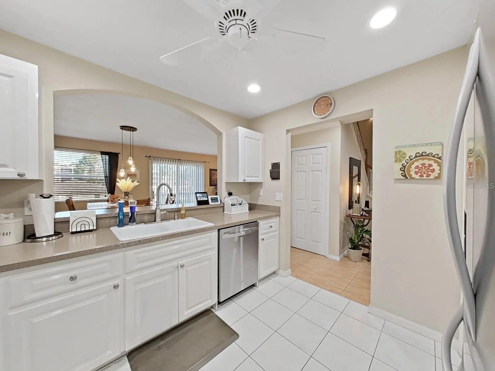 OPENS UP BEAUTIFULLY TO THE DINING AND FAMILY ROOM!