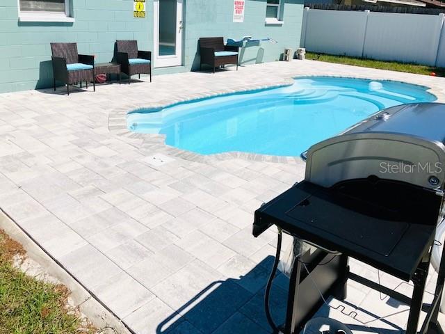 Expansive backyard space ideal for gatherings, grilling, and maximizing short term rental appeal.