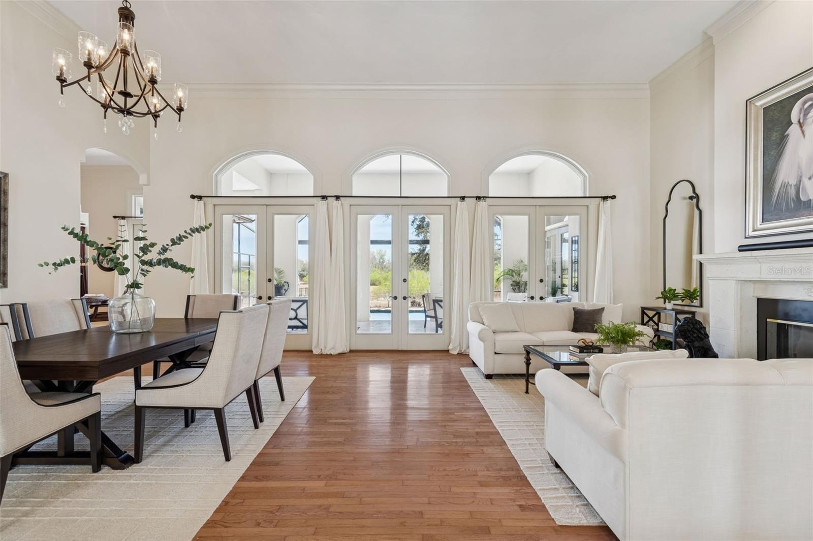 The Combo Living Room Dining Room Has Elegant Wood Flooring