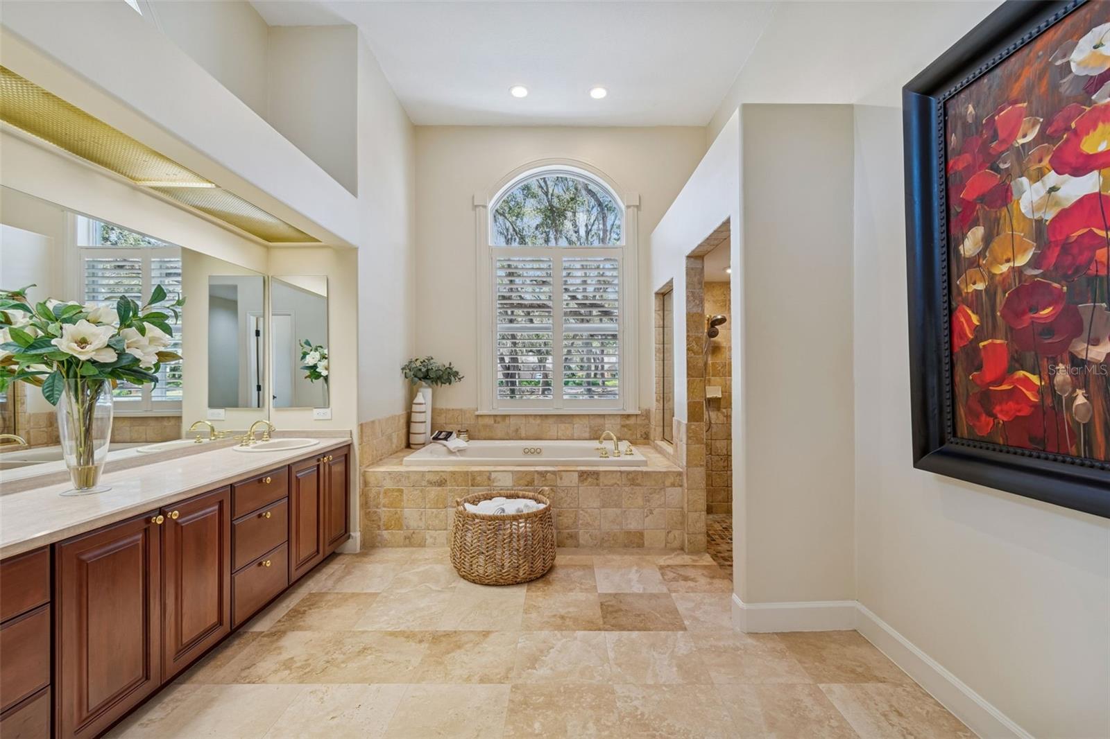Master Bath Has Travertine Tile, Double Sinks, Jetted Tub, And Walk-In Shower