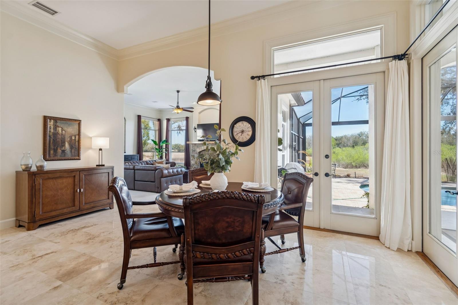 Generous Kitchen Dinette With Double French Doors Leading To The Lanai.