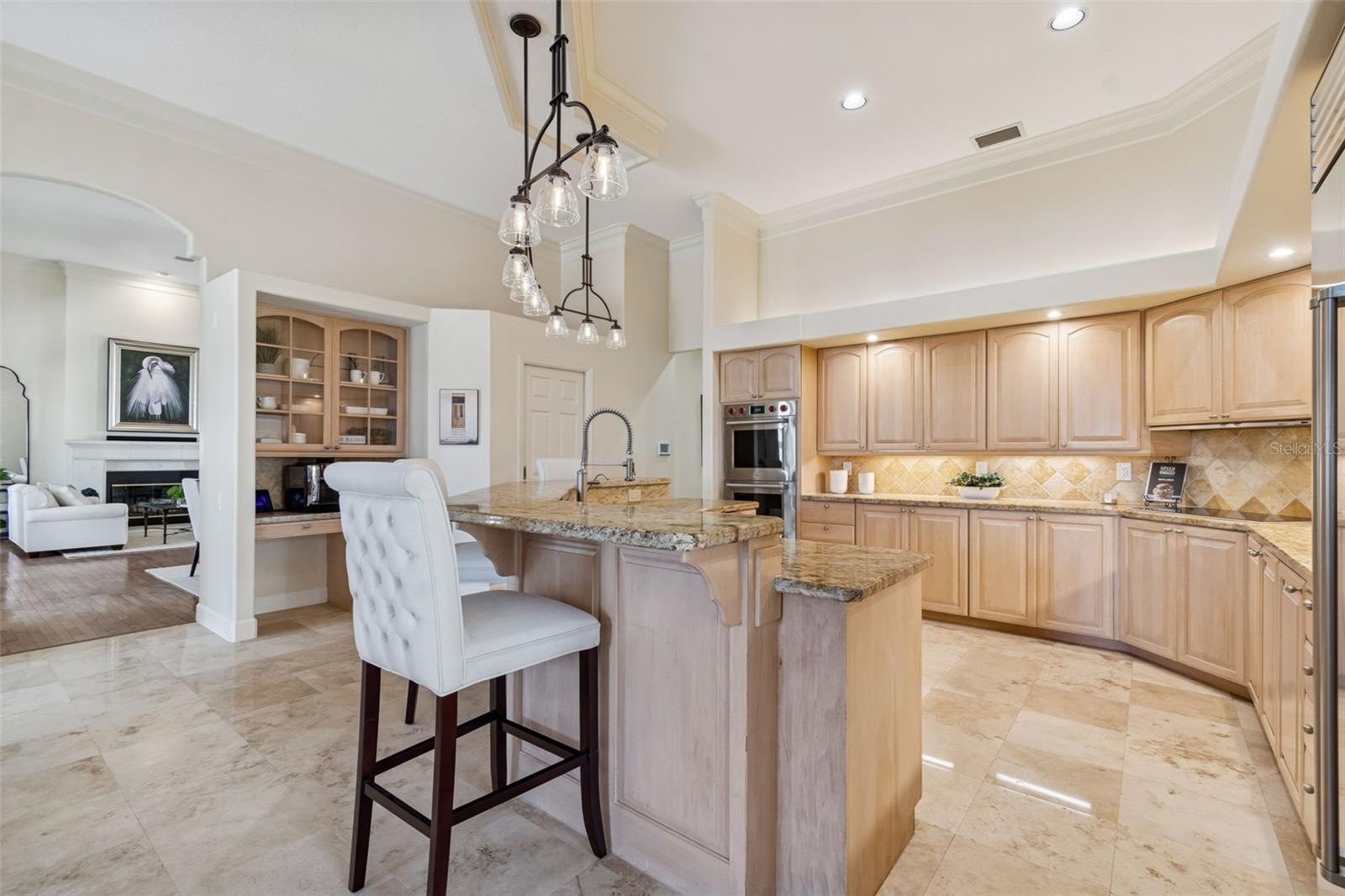 Kitchen Has Wolf Double Ovens And Wolf Convection Stove Top.
