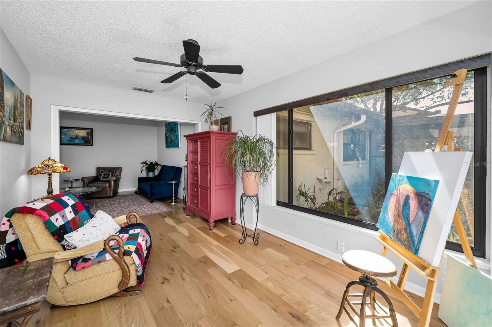 Florida Room off of Living Room- Heated/Cooled adding 150 sf