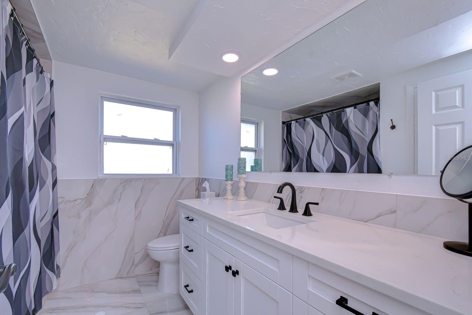 The updated primary bathroom.