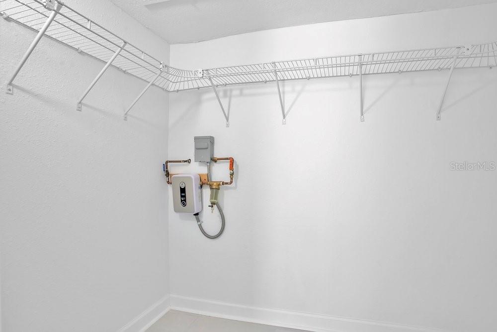 Bedroom one walk in w tankless water heater