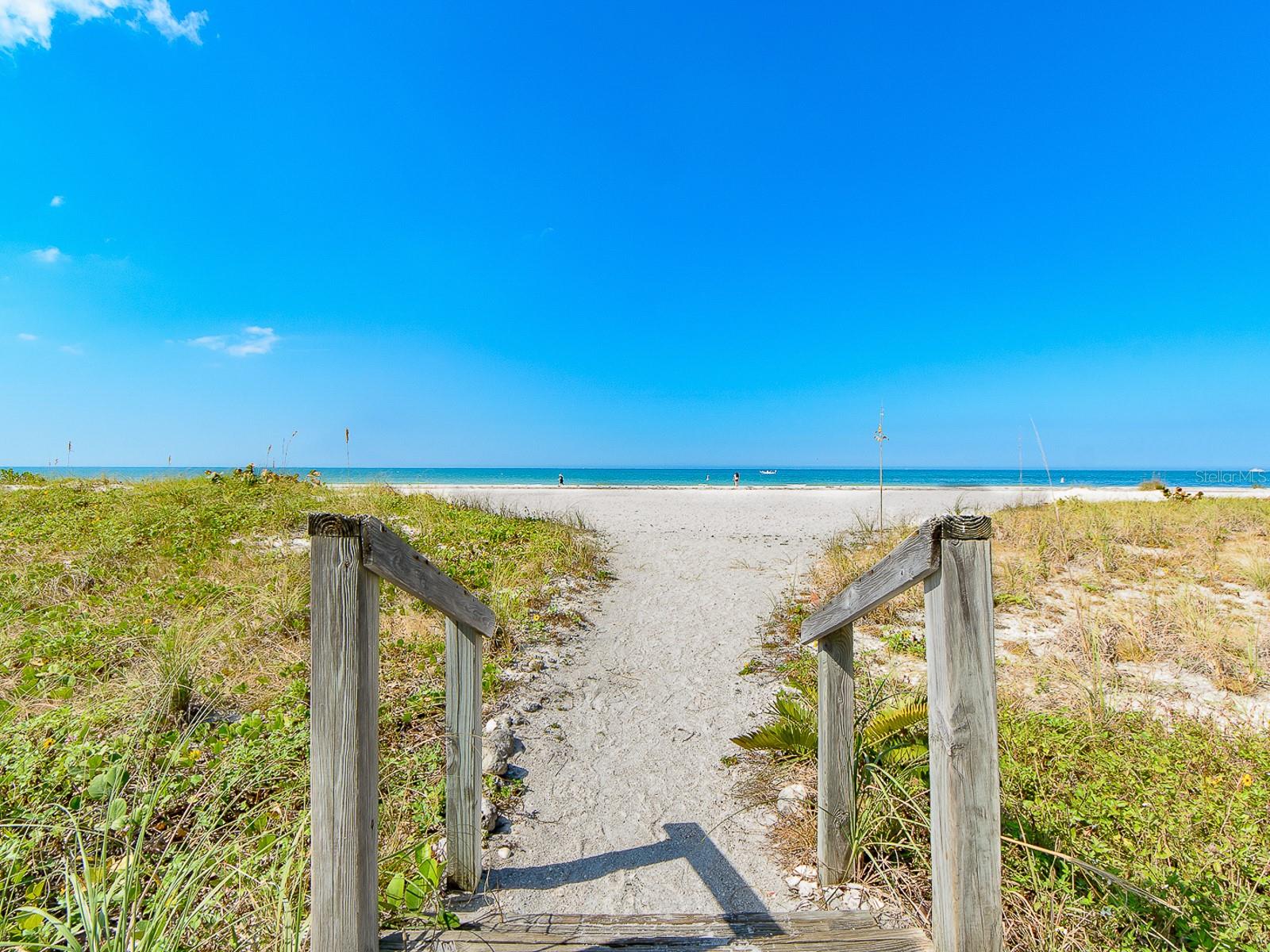 Steps away from the beautiful Sand Key Beach and Gulf.