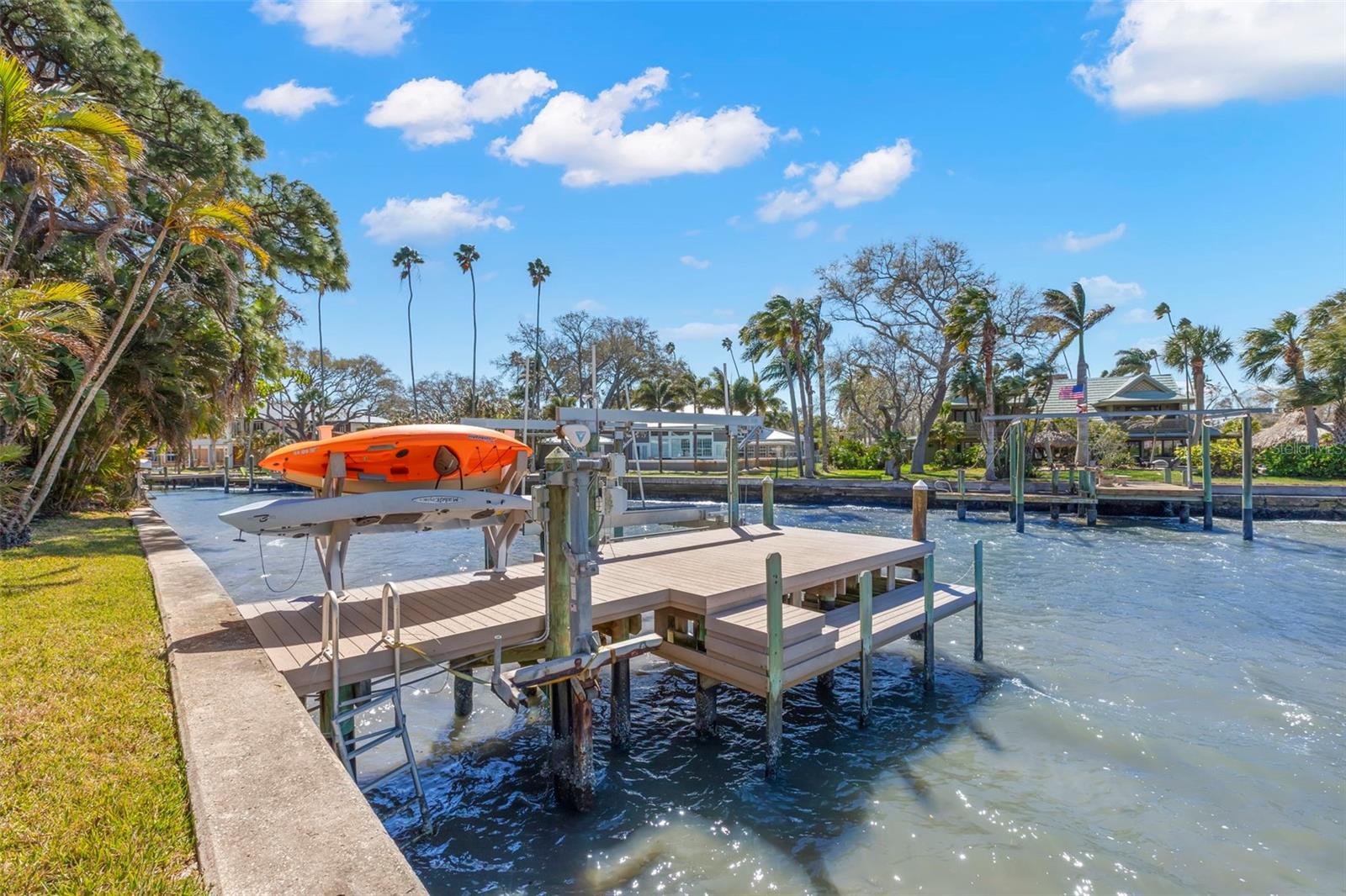 Dock with lift and kayak rack
