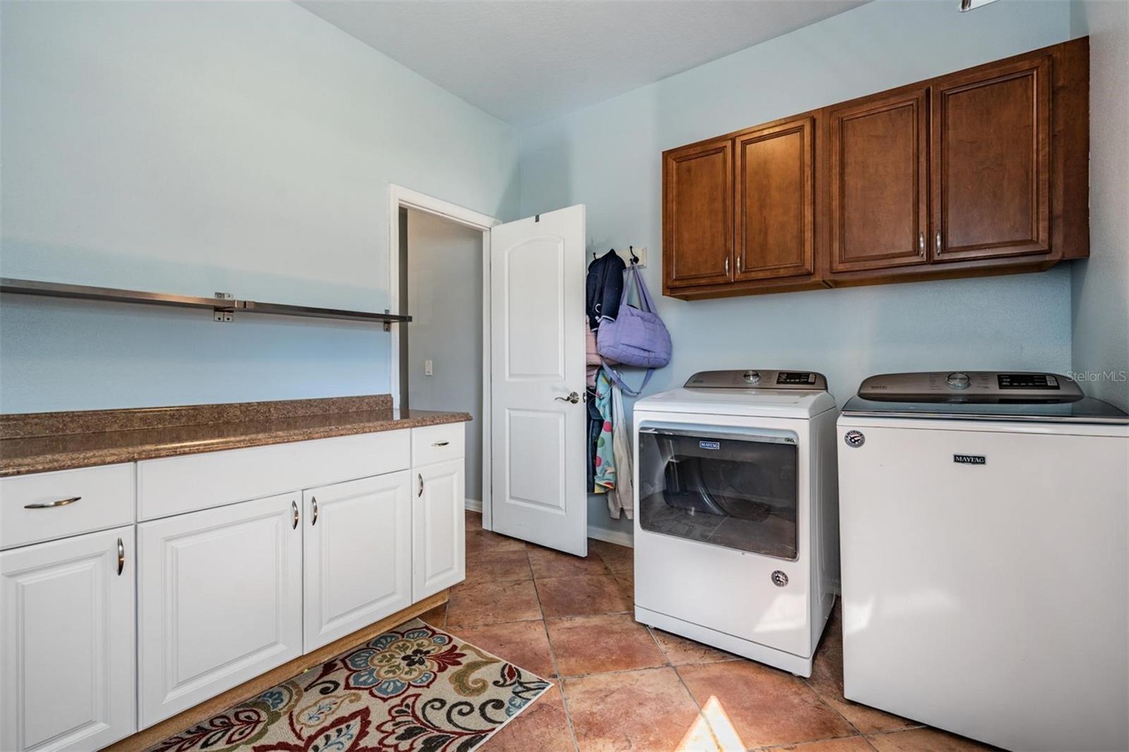 Laundry room with plenty of storage