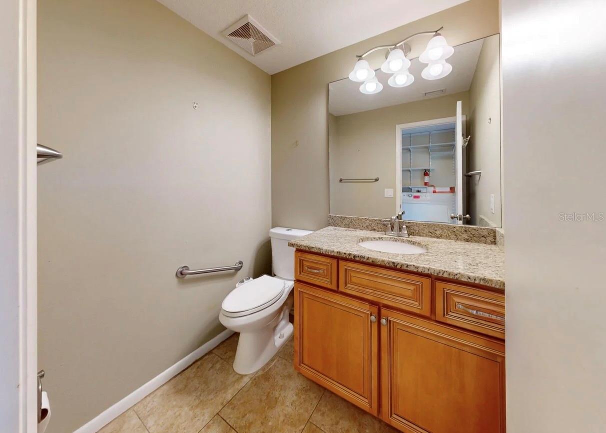 Half Bathroom Next to Laundry Room