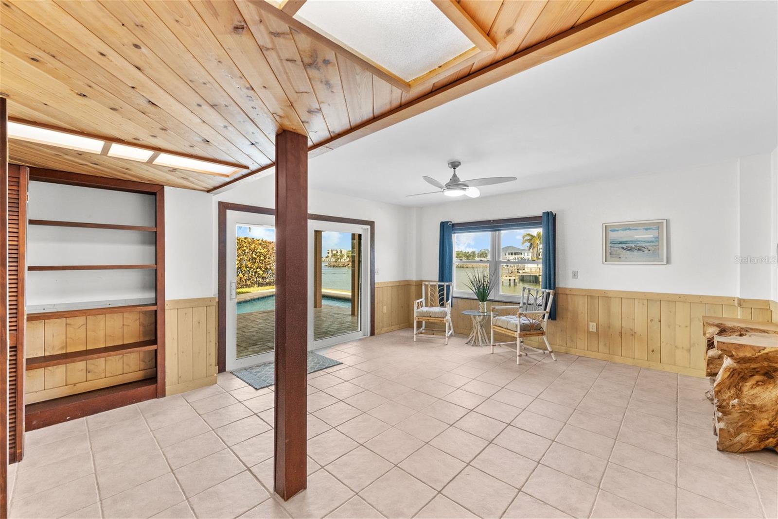 Recreation Room with Sliders out to inground pool.