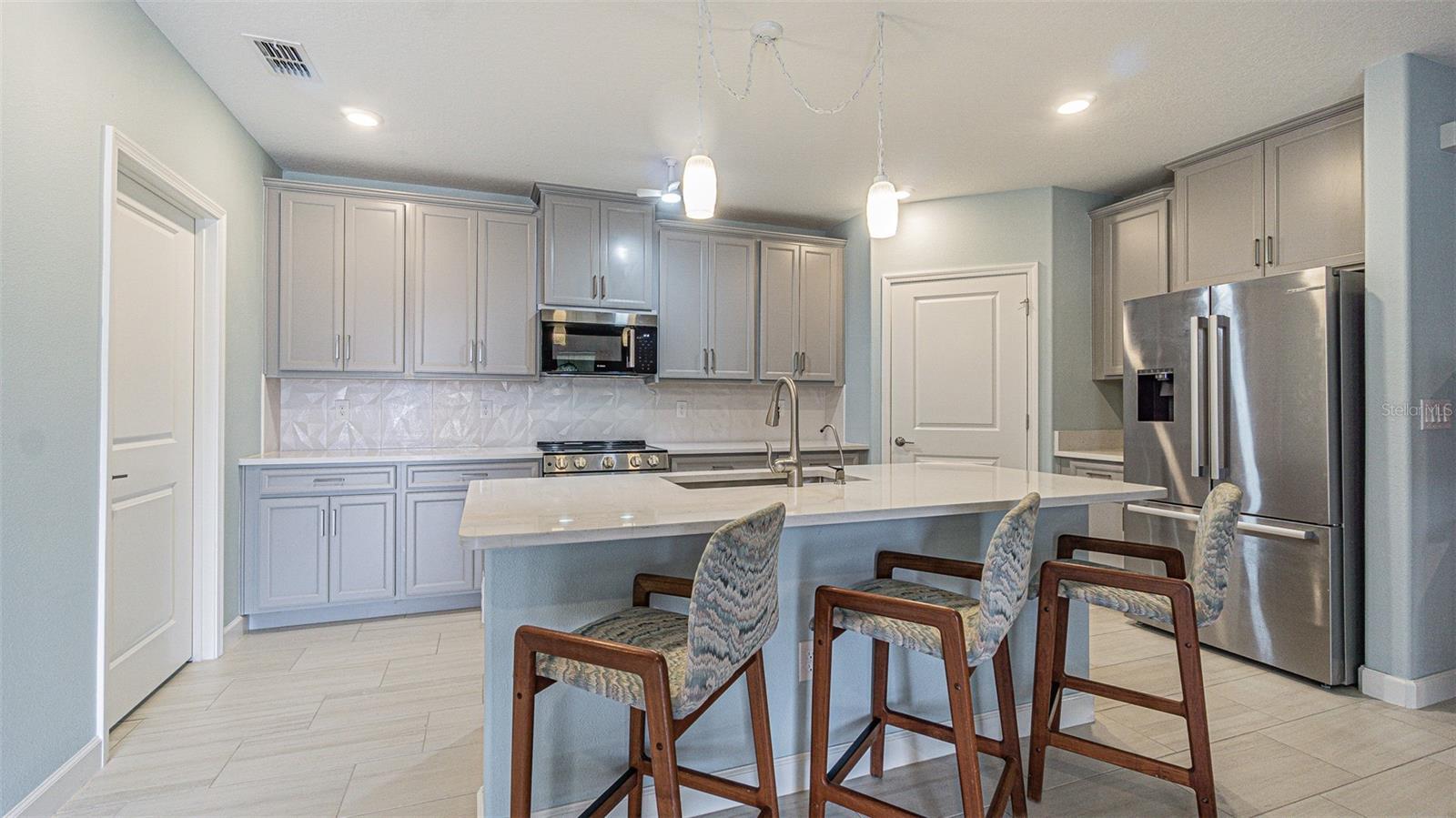 Grey 42" cabinets with quartz tops