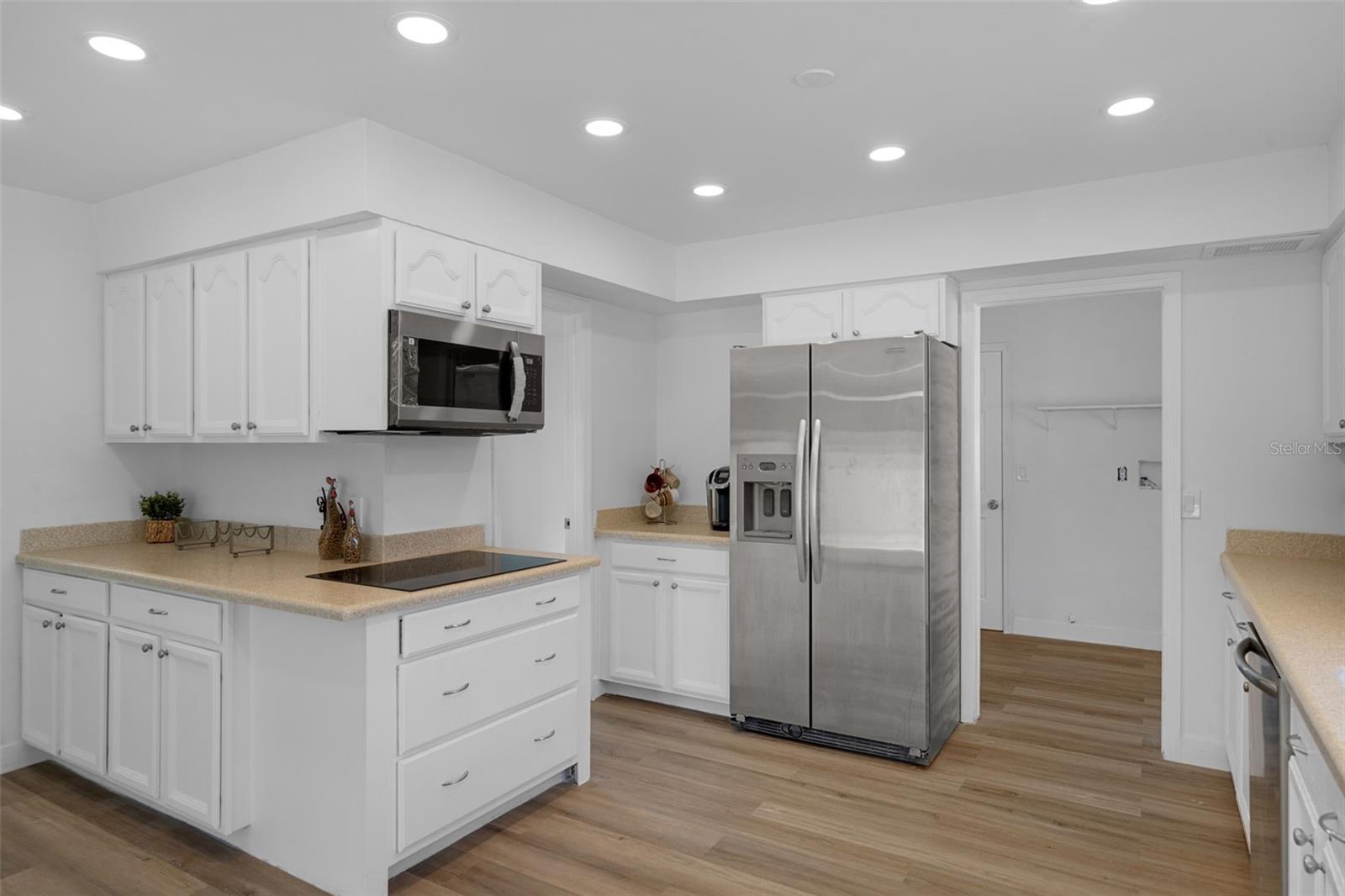 Notice the stainless steel appliances