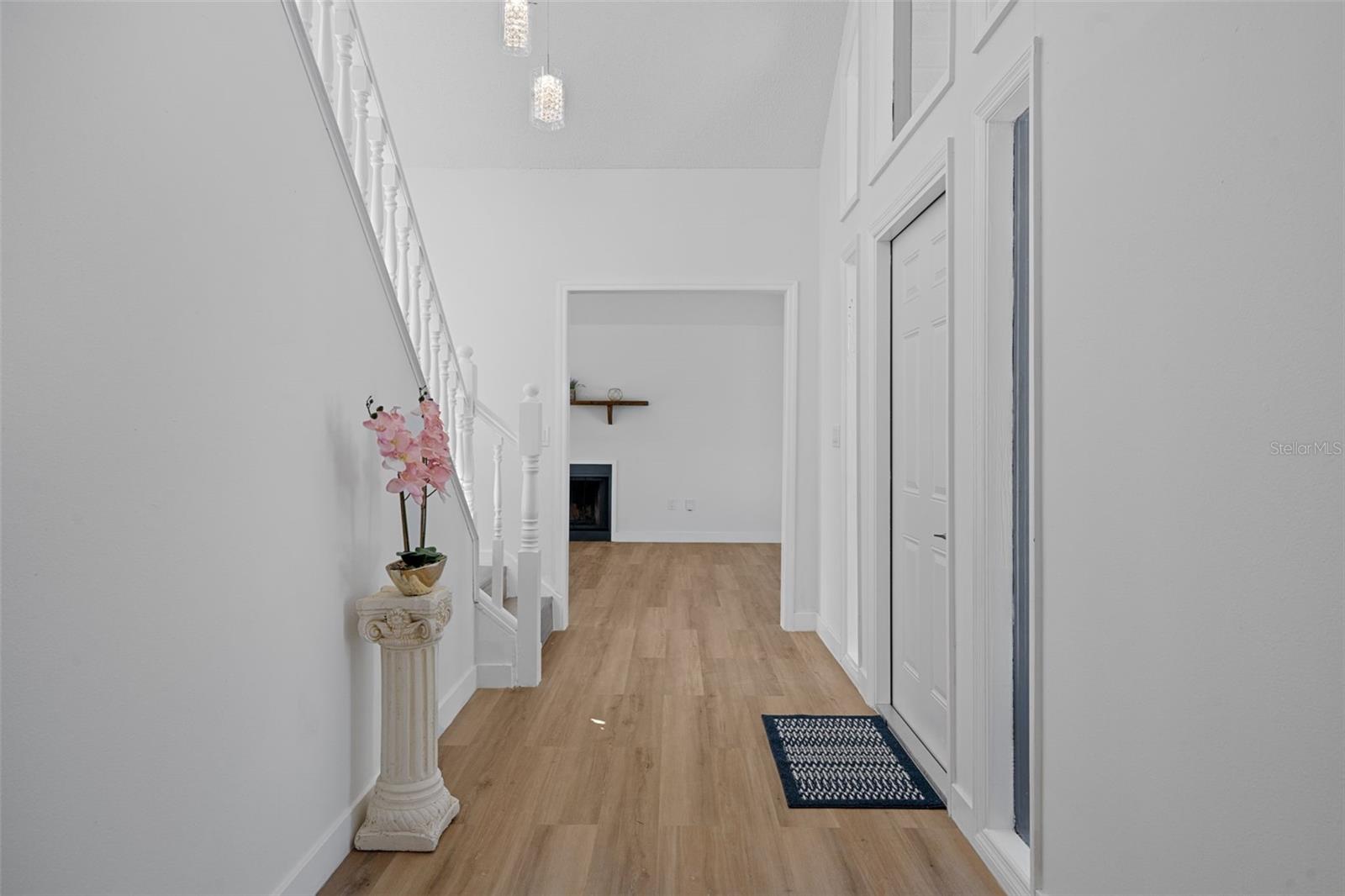 Notice the gorgeous luxery vinyl plank wood flooring throughout the home