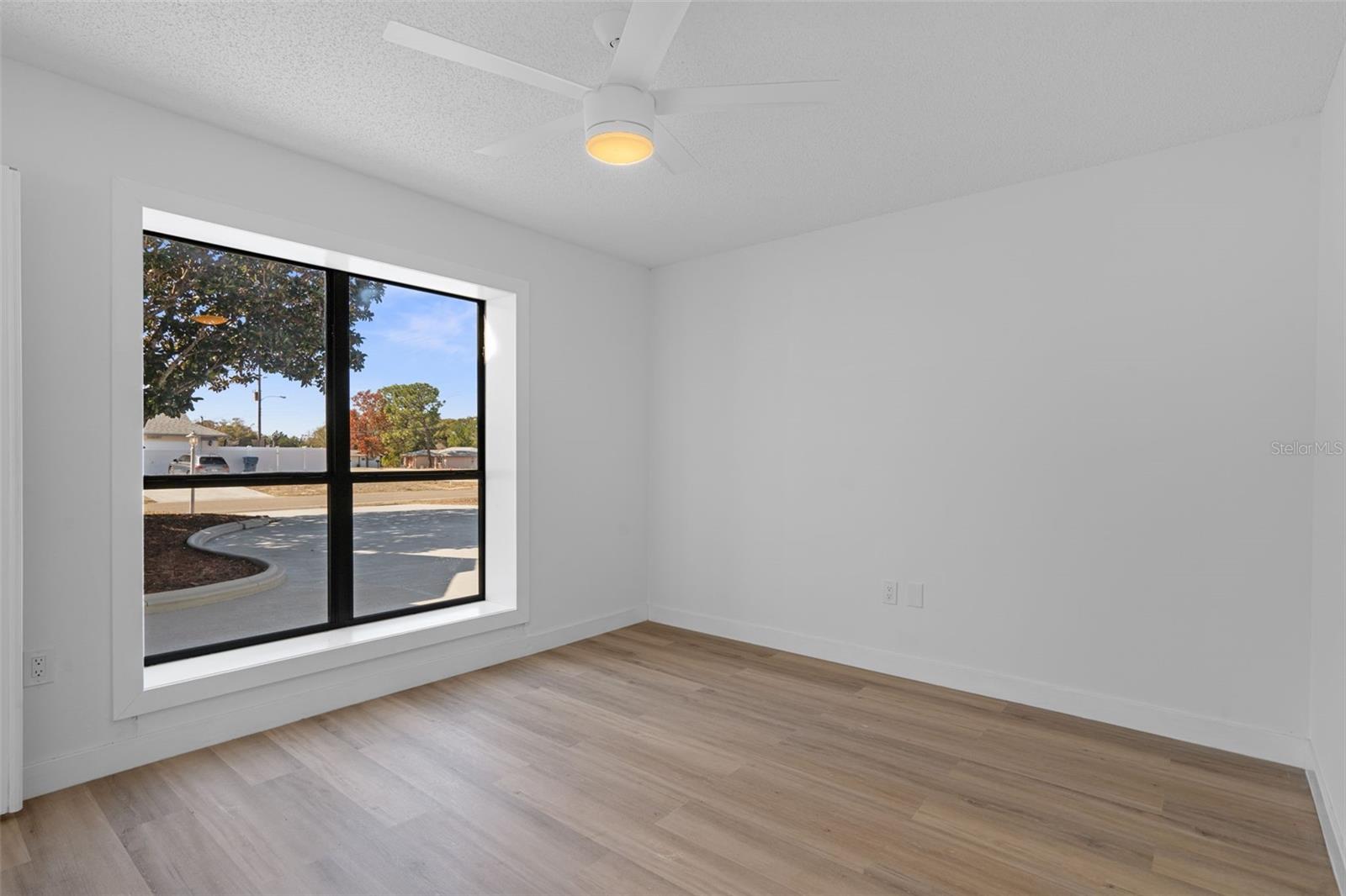The large window in the family room makes the space light and bright